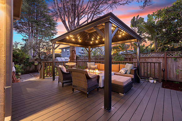 Twilight real estate photography of a luxury Emerald Hills home at sunset