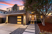 Twilight real estate photography of a luxury Emerald Hills home at sunset