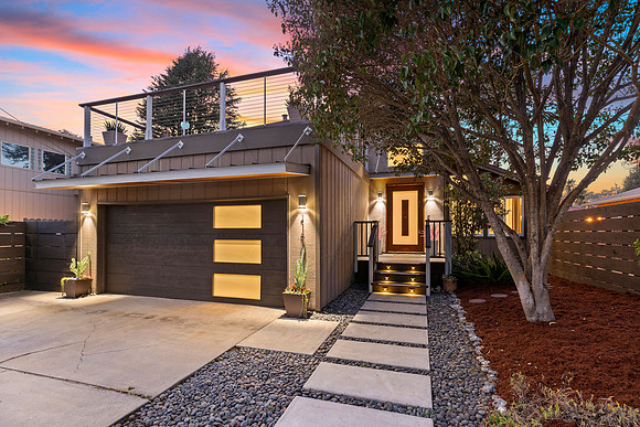 Twilight real estate photography of a luxury Emerald Hills home at sunset