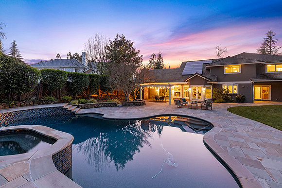Twilight real estate photography of a luxury Emerald Hills home at sunset