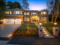 Twilight real estate photography of a luxury Emerald Hills home at sunset